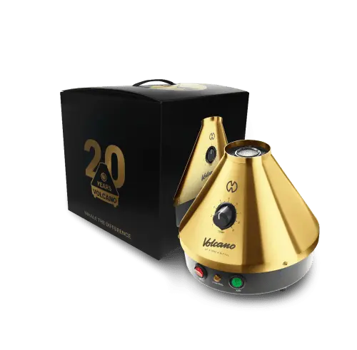 Vaolcano Classi Vaporizer in der Gold Edition neben seiner in Schwarz Gold gehaltener Verpackung mit Tragegriff